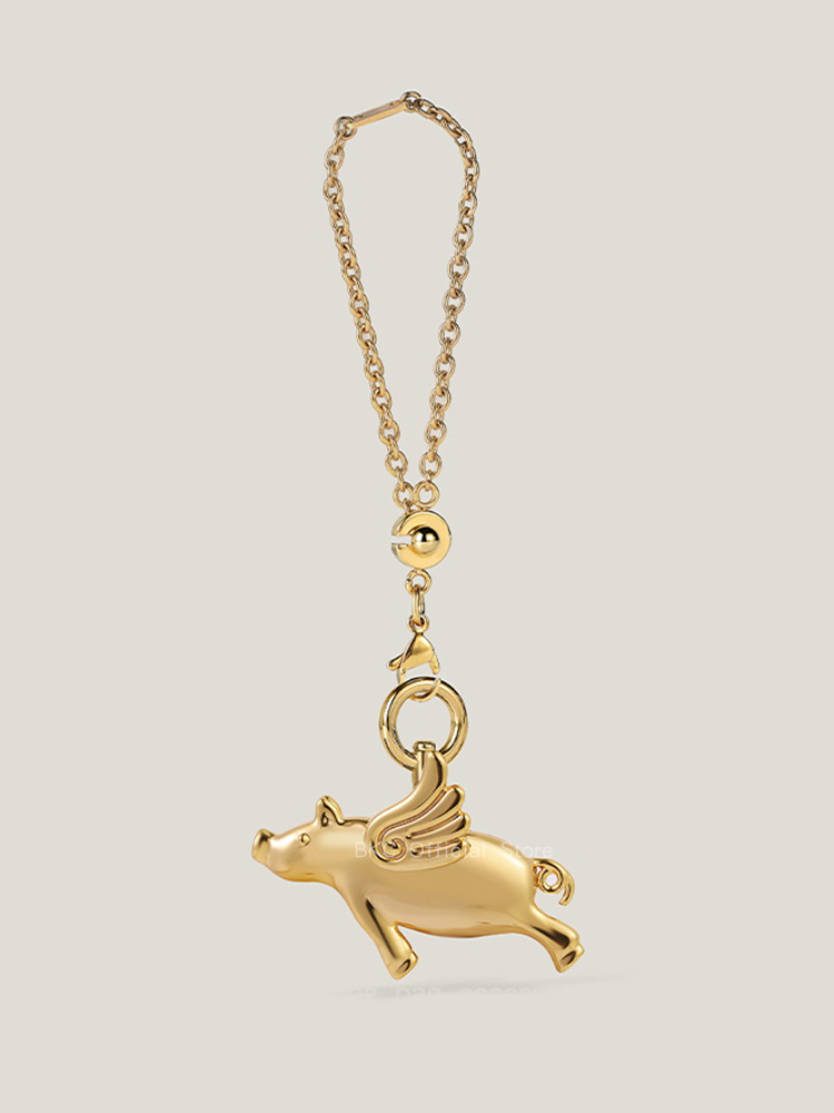 Luxury Brass Fliggy Bag Charm  - Luxury Bags Hermes avis et prix
